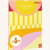 The bright and retro style cardboard packing for the candy bee wall decoration available at Babipur
