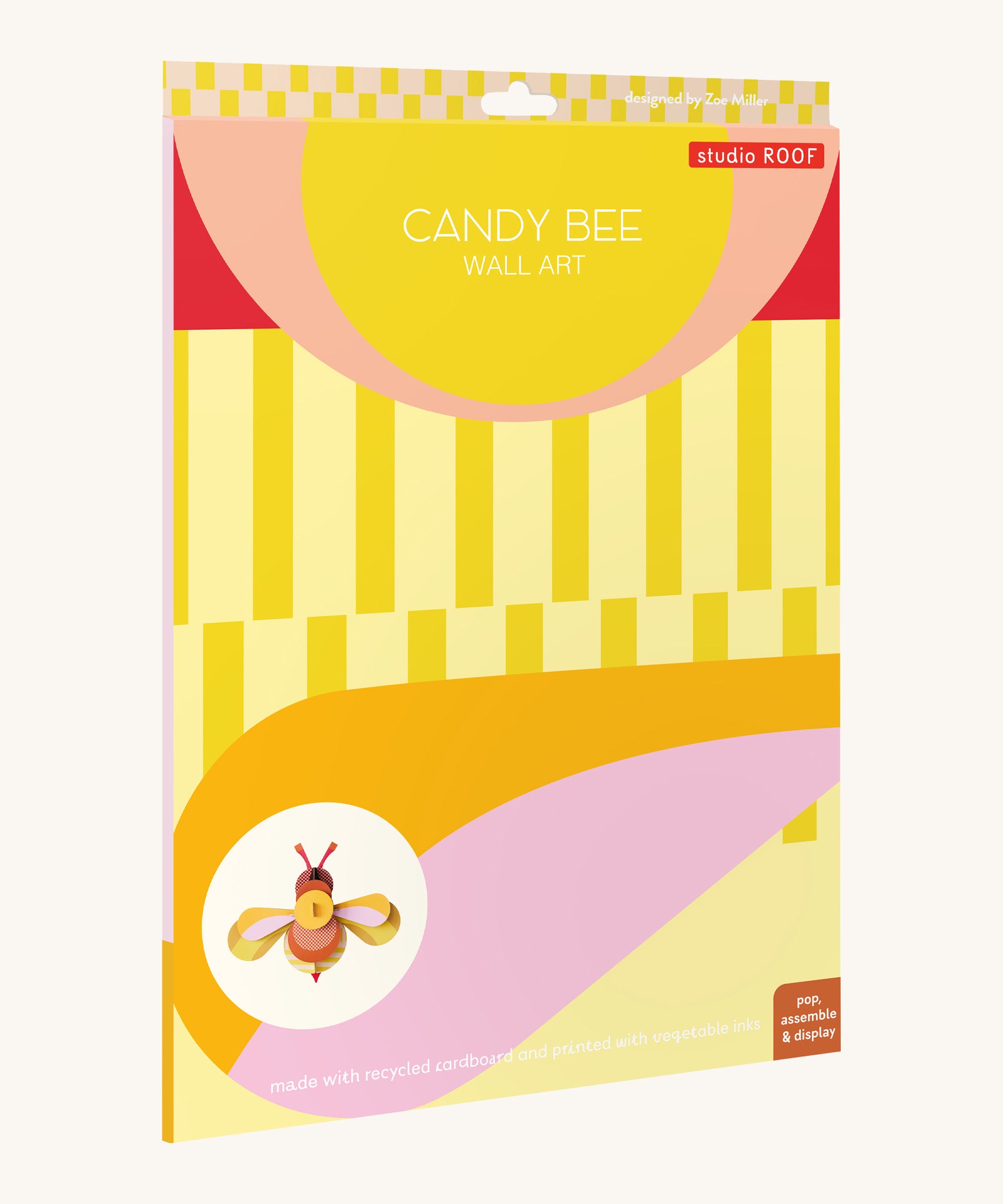 The bright and retro style cardboard packing for the candy bee wall decoration available at Babipur