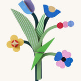 A bright and retro style daisy belle wall decoration available at Babipur. A Studio roof collaboration with artist Zoe Miller.