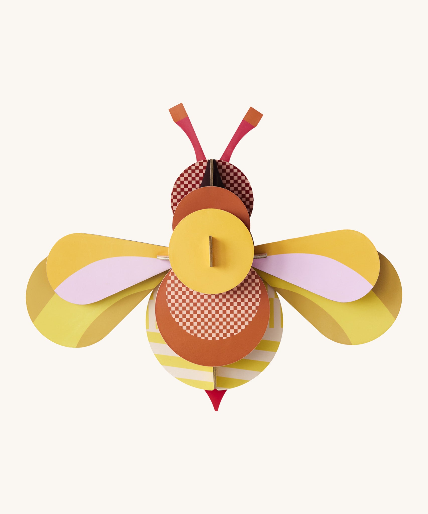 A bright and retro style candy bee wall decoration available at Babipur. A Studio roof collaboration with artist Zoe Miller.