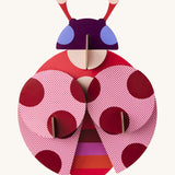 A bright and retro style dotted lady wall decoration available at Babipur. A Studio roof collaboration with artist Zoe Miller.