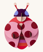 A bright and retro style dotted lady wall decoration available at Babipur. A Studio roof collaboration with artist Zoe Miller.