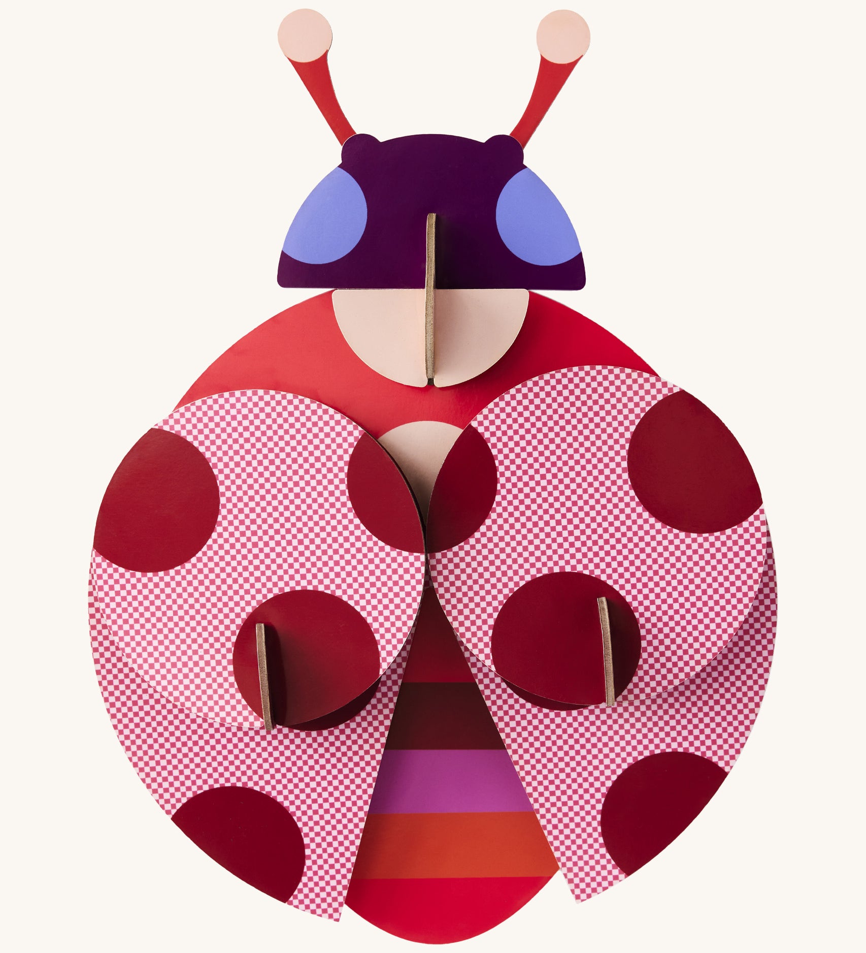 A bright and retro style dotted lady wall decoration available at Babipur. A Studio roof collaboration with artist Zoe Miller.