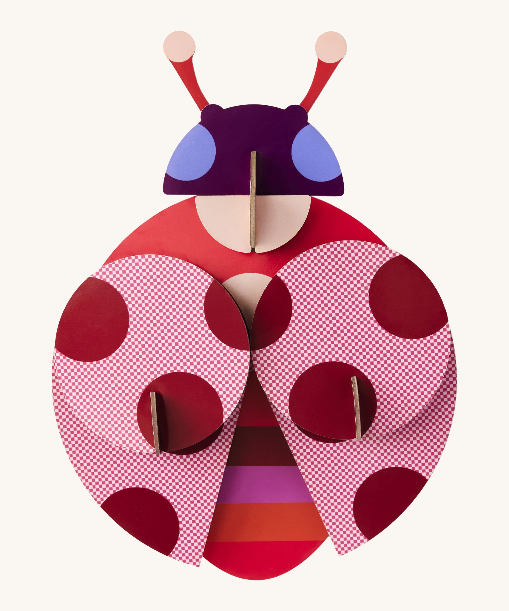 A bright and retro style dotted lady wall decoration available at Babipur. A Studio roof collaboration with artist Zoe Miller.