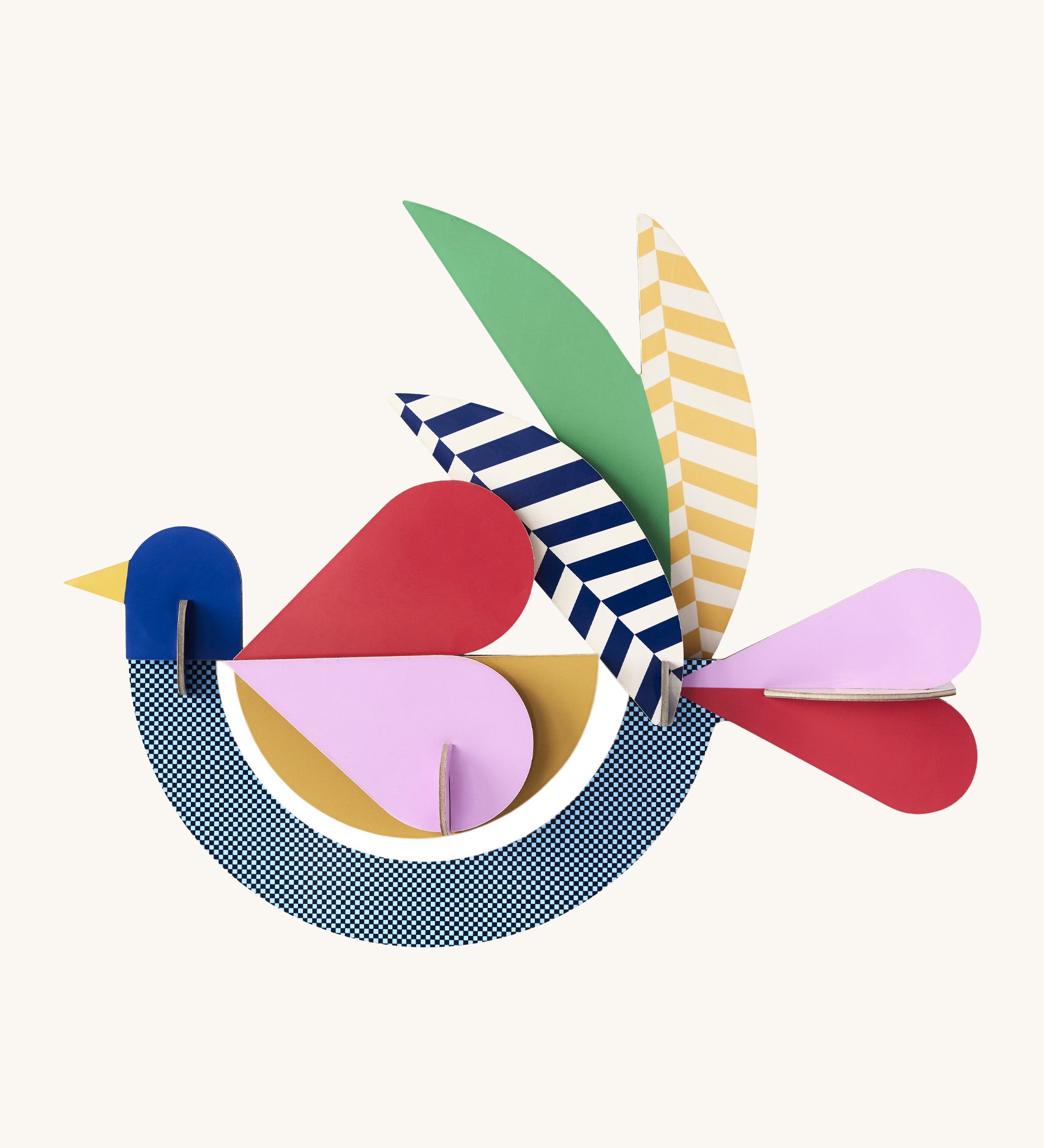 A bright and retro style feathery bird wall decoration available at Babipur. A Studio roof collaboration with artist Zoe Miller.