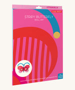 The bright and retro style cardboard packing for the Stripy butterfly wall decoration available at Babipur