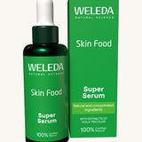 Weleda skin food super serum. A glass bottle with a pipette as a dispenser. This serum is presented in a green box with white branding on the front. Weleda have a range of luxurious, natural skin care items available at Babipur.