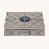 The cardboard decorative box for the Wooden Story Rattles, which comes beautifully wrapped in brown string. The perfect gift for little ones.