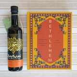 Filled with authentic Palestinian recipes, the Zaytoun Bethlehem Cookbook by Fasi Kattan is a true celebration of the region’s food next to a bottle of Fairtrade Olive Oil — find it at Babipur.