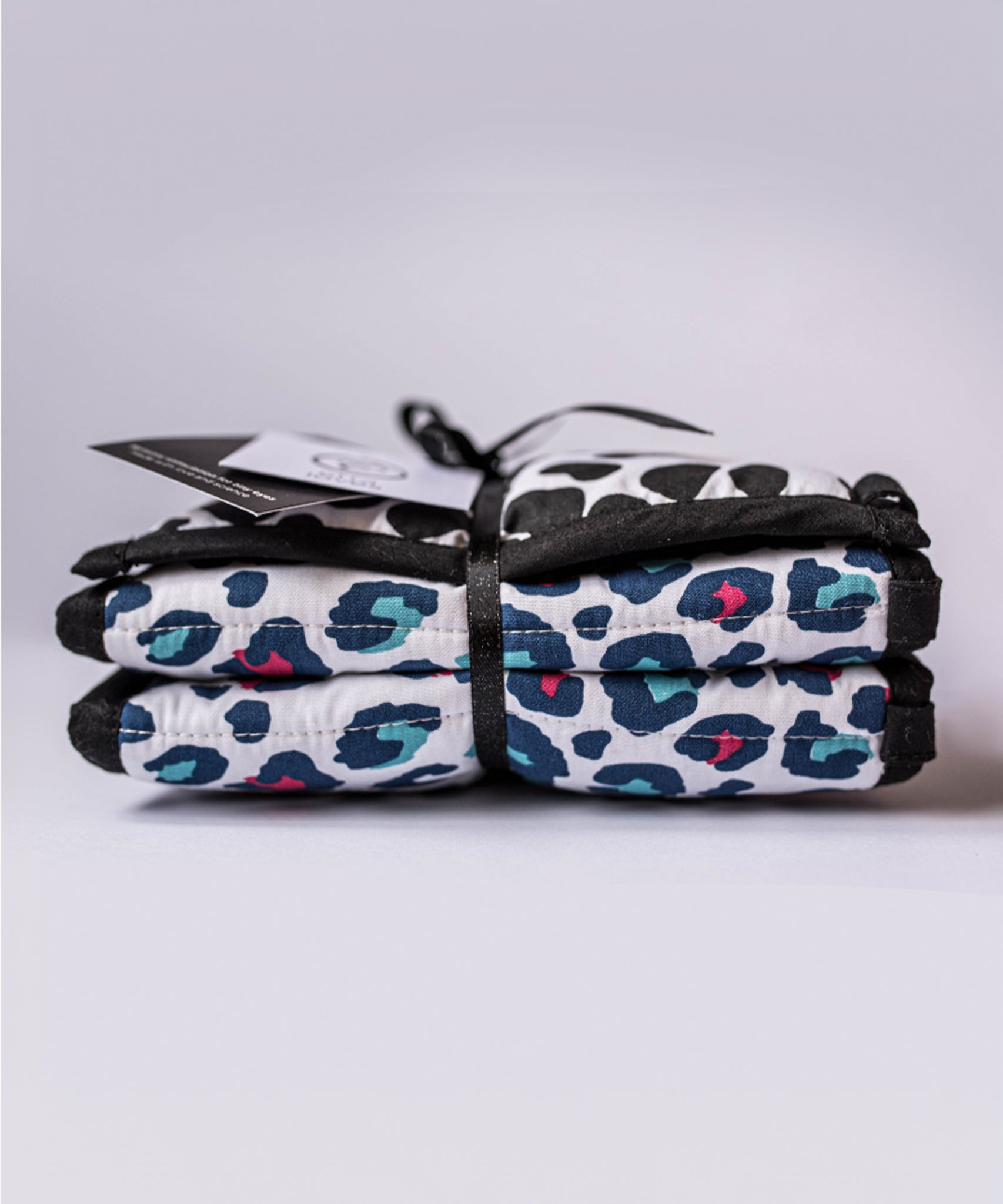 and a colourful red and light blue Leopard print on the other