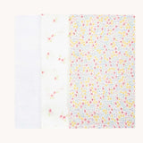 Avery Row Wildflower Baby Muslin Squares in a Set of 3. One cloth is plain white, one has delicate pink flowers and one has an all over floral wildflower design. Avery Row have a collection of stylish nursery and baby essentials available at Babipur.