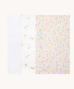 Avery Row Wildflower Baby Muslin Squares in a Set of 3. One cloth is plain white, one has delicate pink flowers and one has an all over floral wildflower design. Avery Row have a collection of stylish nursery and baby essentials available at Babipur.