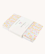Avery Row Wildflower Baby Muslin Squares in a Set of 3. One cloth is plain white, one has delicate pink flowers and one has an all over floral wildflower design. Avery Row have a collection of stylish nursery and baby essentials available at Babipur.ipur.