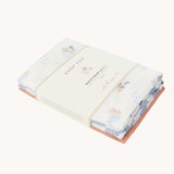 Avery Row Coastline Baby Muslin Squares in a Set of 3. The pack has one plain coral coloured cloth, one check blue and white waves design and one coastline print design. Avery Row have a range of stylish baby and nursery essential available here at babipur.