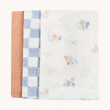 Avery Row Coastline Baby Muslin Squares in a Set of 3. The pack has one plain coral coloured cloth, one check blue and white waves design and one coastline print design. Avery Row have a range of stylish baby and nursery essential available here at babipur.