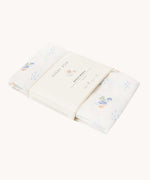 Avery Row Coastline baby Muslin Swaddle. The swaddle features a delicate coastline print that has corals and little blue fish. Avery Row have a collection of stylish nursery and baby essentials available at Babipur.