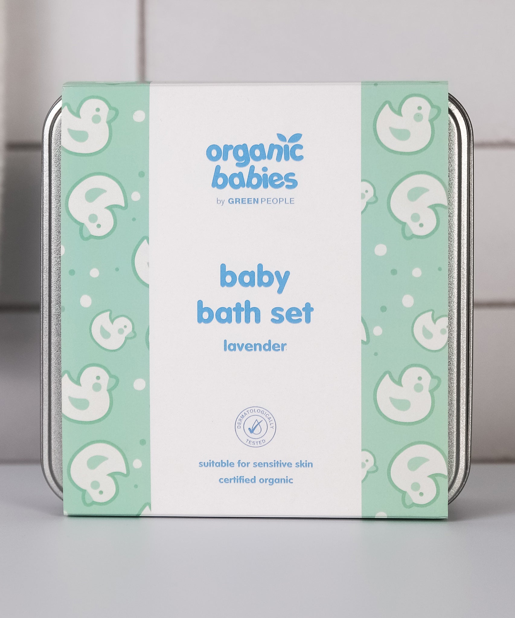 and next to a wooden mouse and wooden teething toy