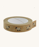 A roll of Babipur eco paper craft tape in brown with a sheep and daisies print.