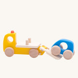 The car transporter from the Bajo emergency vehicle set. A yellow car transporter lorry that comes with a little blue wooden car. These heirloom quality toys by Bajo are part of a wide range of wooden toys available here at Babipur.