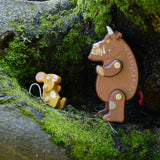 Bajo Gruffalo character wooden toys flatlay featuring Ostheimer play cloths and Babipur Lanka Kade collaboration pieces