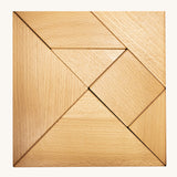 Bajo tangram puzzle set showing 7 natural wooden pieces in different geometric shapes