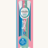 Ben & Anna coco mania toothpaste showing a blue, pink and green striped design on the packaging with a playful smile slogan in white in the middle