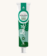 Ben & Anna certified 100% natural toothpaste in spearmint flavour. Showing a green striped and waves design on the tube. Features a playful smile slogan in white in the middle.