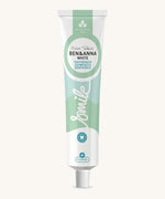 Ben & Anna certified 100% natural white toothpaste showing a green wave design on the tube with a playful smile slogan in white in the middle.