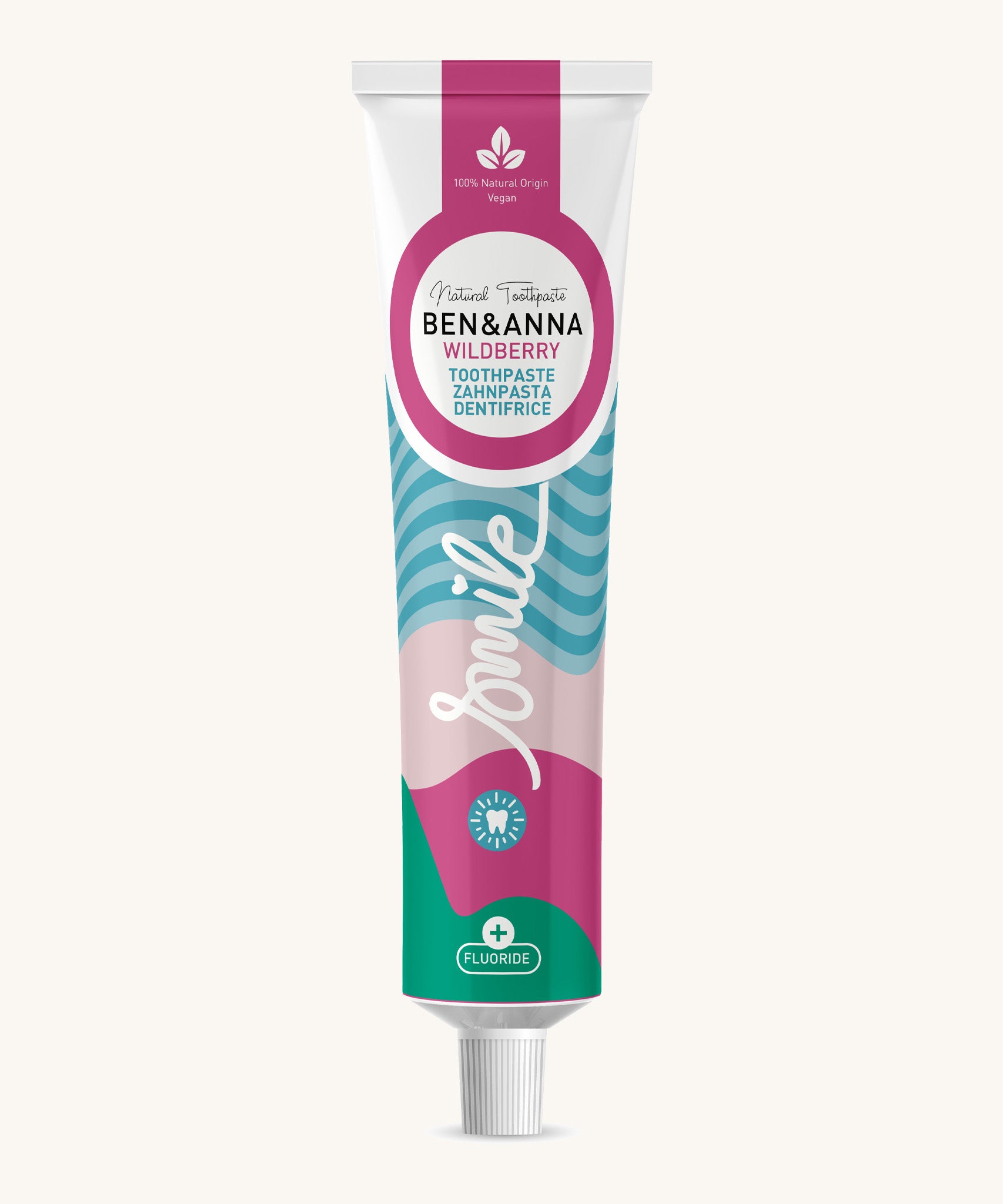 Ben & Anna Certified 100% natural toothpaste in wild berry flavour. Showing a blue stripe with pink and green wave design on the tube. Features a playful smile slogan in white in the middle.