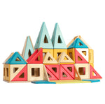 Pieces of the Big Future toys Coloured Earth Tiles built into a large building shape on a white background