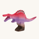 Pink and purple big standing spinosaurus on a cream background