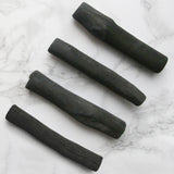 A close up of the Black+ Blum active charcoal filters showing the filter detail