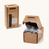 A close up of the brown cardboard packaging Black+ Blum active charcoal filters showing the filter detail