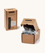 A close up of the brown cardboard packaging Black+ Blum active charcoal filters showing the filter detail