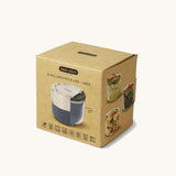 A close up of the brown cardboard packaging holding the Black + Blum leakproof microwave safe glass lunchbowl in slate available at Babipur.