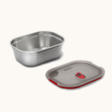 Black + Blum 900ml stainless steel microwave safe leakproof lunchbox  with the lid removed. Lunchbox available at Babipur.