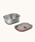 Black + Blum 900ml stainless steel microwave safe leakproof lunchbox  with the lid removed. Lunchbox available at Babipur.