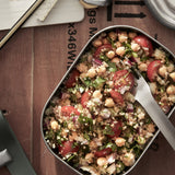 A Black & Blum olive stainless steel lunchbox filled with food ready for eating. Lunchbox is available at Babipur