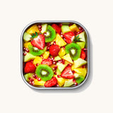 A close up of a Black + Blum square stainless steel leakproof microwave safe lunchbox showing different fruit inside the lunchbox