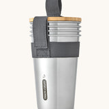 A set of 4 Black + Blum stainless steel cups available at Babipur. Features a handy black carry strap and a protective Bamboo lid which can be used as a bottle opener