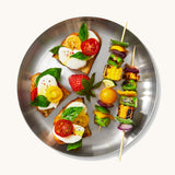 A top down view of the Black + Blum  plates showing various salad foods on the plate