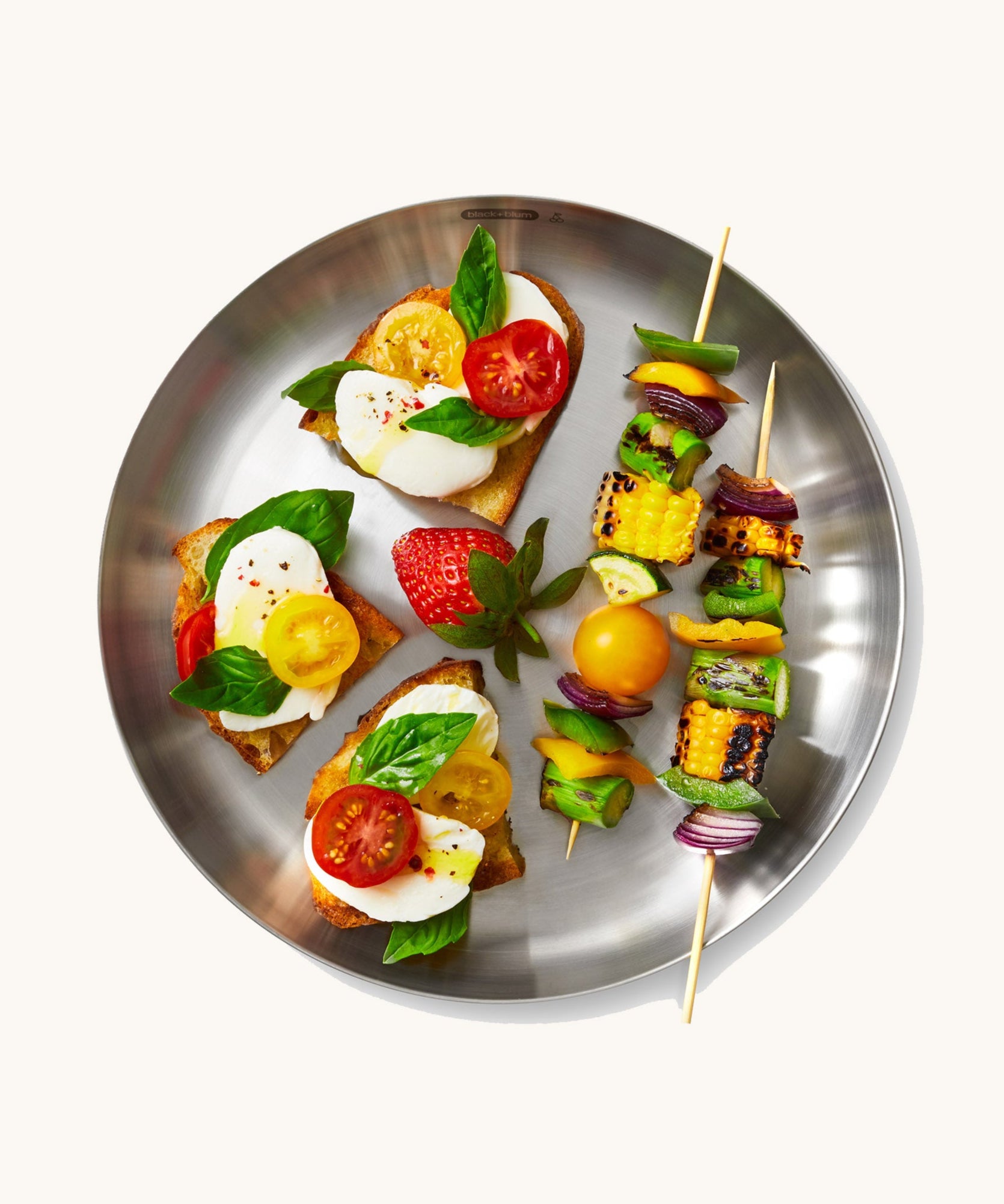 A top down view of the Black + Blum  plates showing various salad foods on the plate