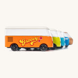 A group shot of 5 different CandyLab Volkswagen CandyVans, all placed one behind the other.