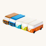 A group shot of 5 different CandyLab VW CandyVans, placed next to each other in a row.