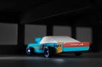 Close up of the back of the Candylab plastic-free racing car toy on a black and grey background