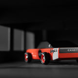 Close up of the back of the Candylab wooden seagull racing car toy on a black and grey background