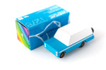 Candylab blue mule wooden car toy on a white background next to its blue box