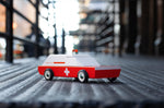 Close up of the Candylab wooden ambulance car on a metal floor