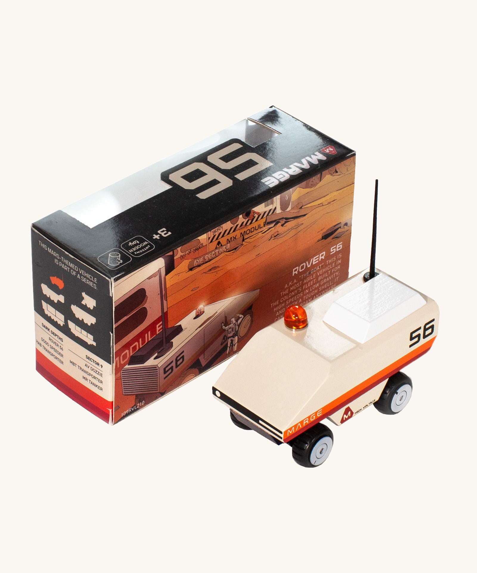 CandyLab cream orange and red Rover space vehicle with the number 56 on the side and a black antenna - with original cardboard packaging.