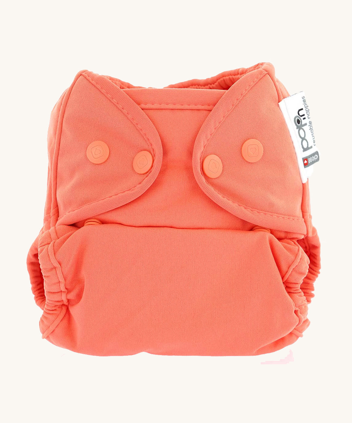 The Close Parent Pop-In reusable cloth nappy with popper fastenings, in coral pink / orange